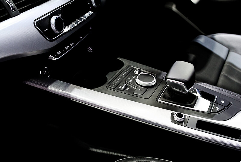 Center console with gear shift in car